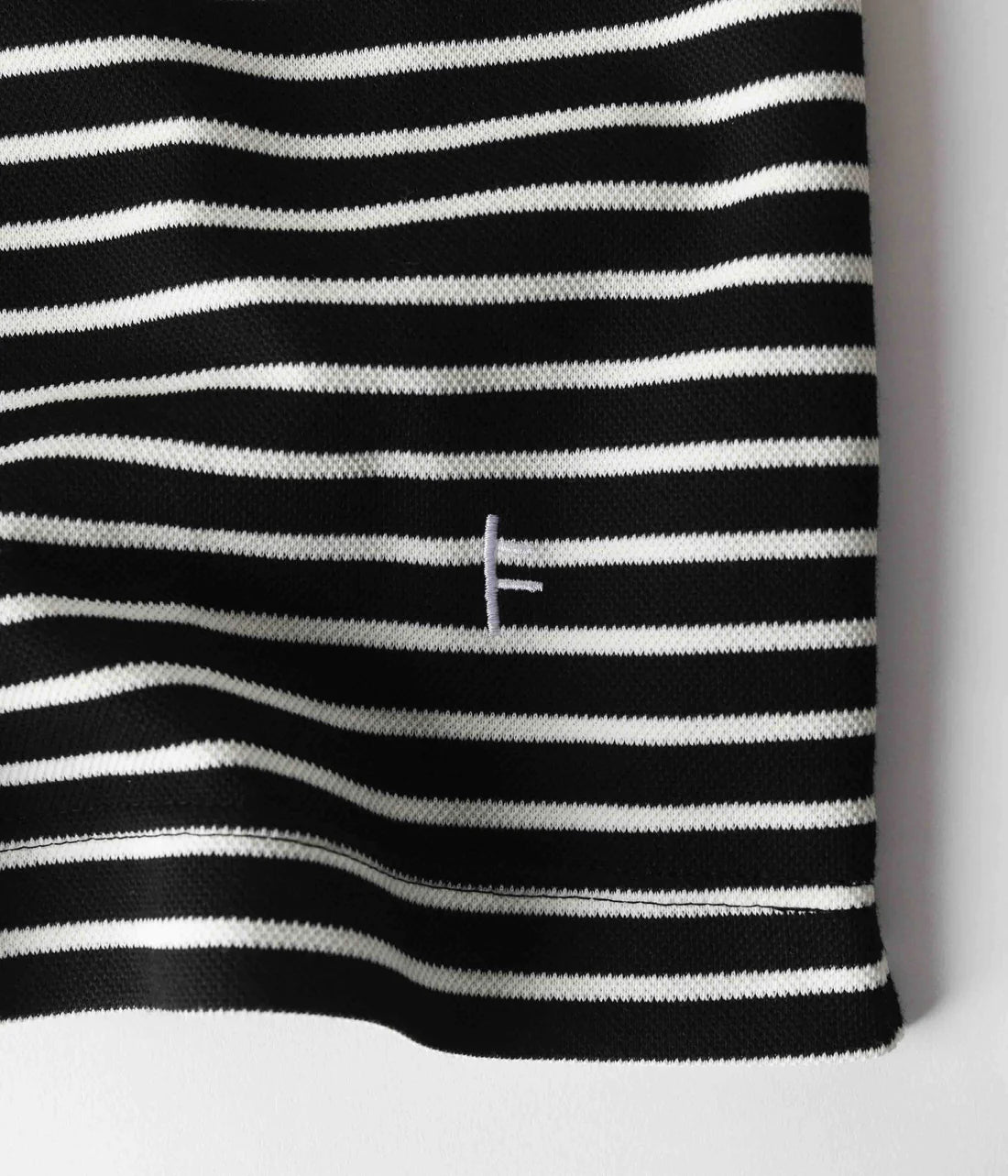 UNIFORM STRIPED SS POLO // WORN BLACK WHITE